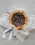 BASQUE CHEESECAKE WITH MILK CHOCOLATE GANACHE